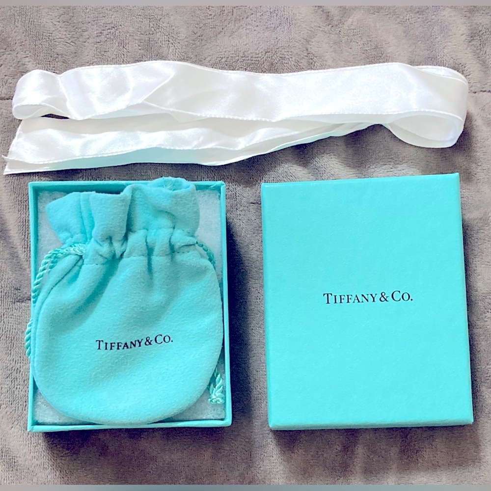 Empty Tiffany &Co. box and pouch